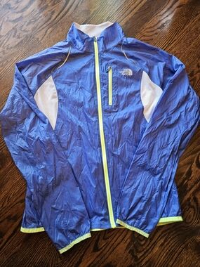 The North Face Better Than Naked women's running jacket in blue with neon yellow
